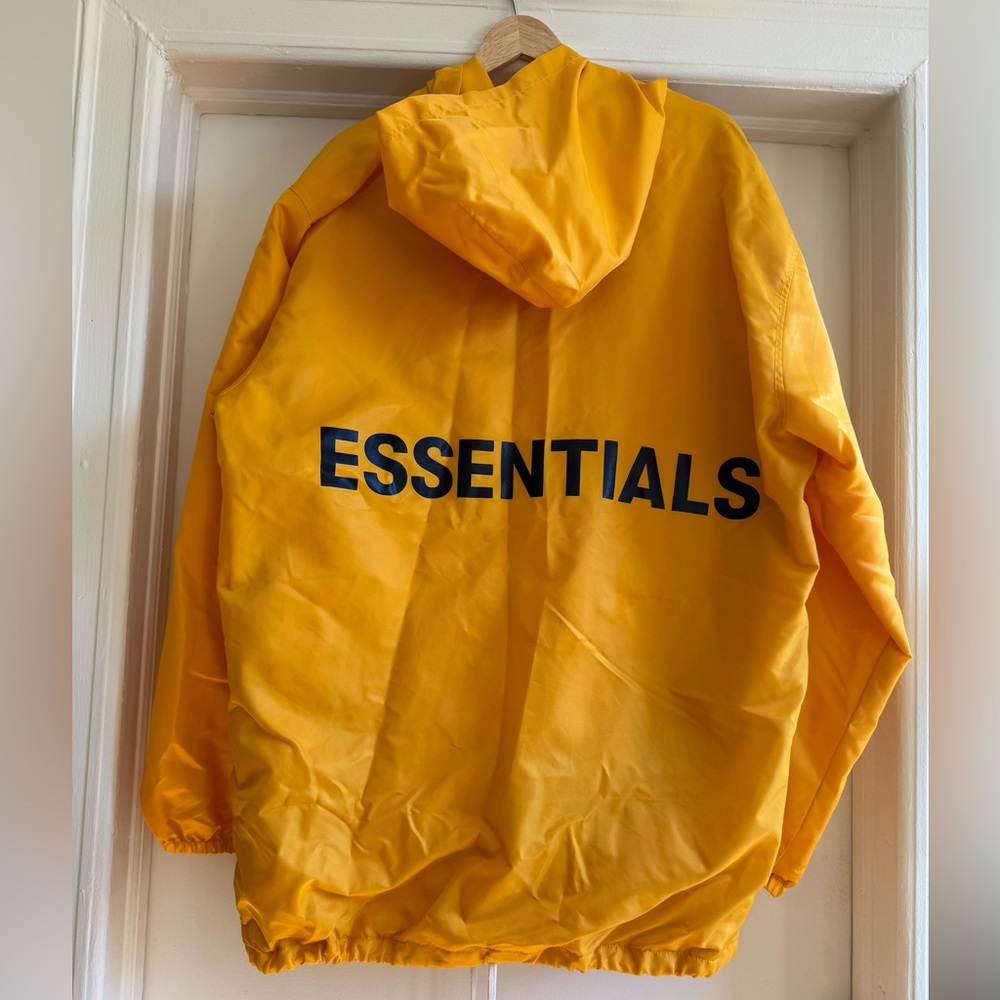 Essentials Graphic Hooded Coach Jacket Yellow - image 1